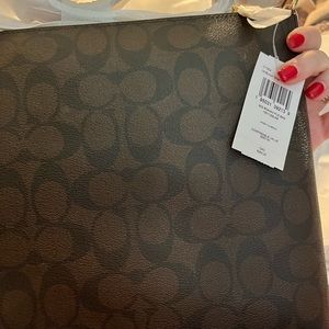 Light pink lined Coach Cross Body NWT